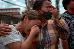 A Nepali city struggles to handle the many bodies on its riverbanks.